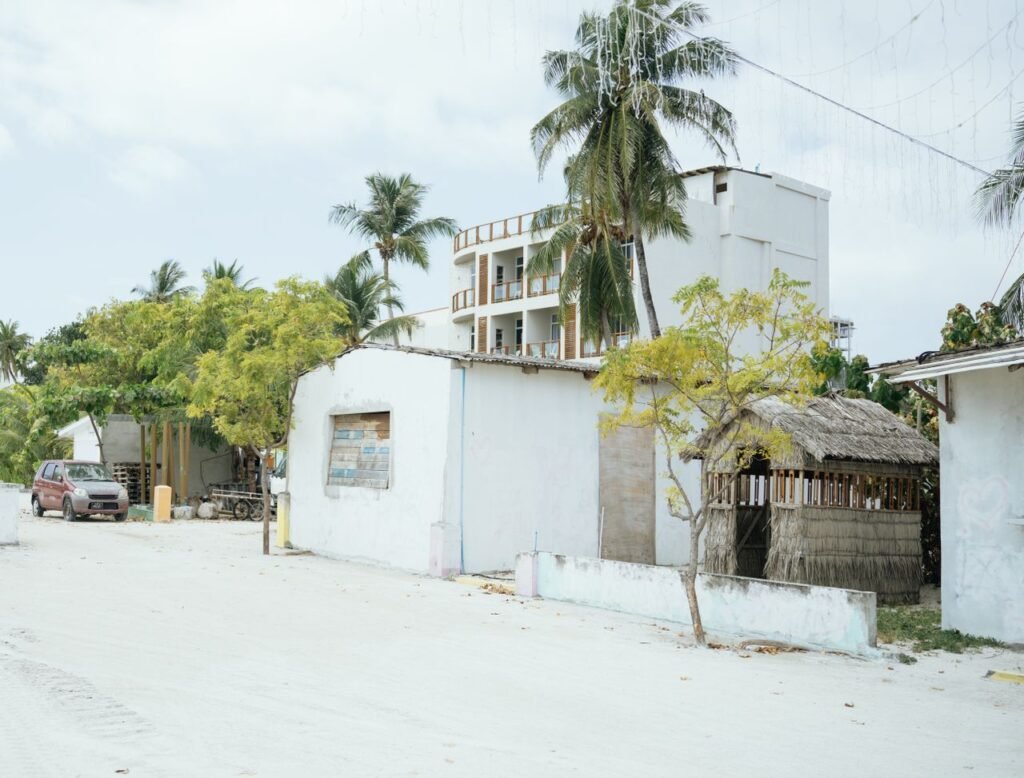 Explore Maafushi's rustic charm, white sandy roads, and tropical architecture.